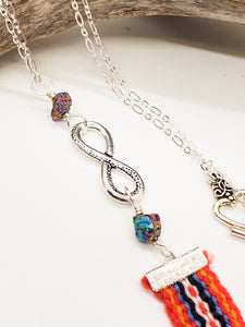 Metis Sash Pendant Necklace with Red Voyageur Sash, Peacock Stone & Silver Infinity Symbol